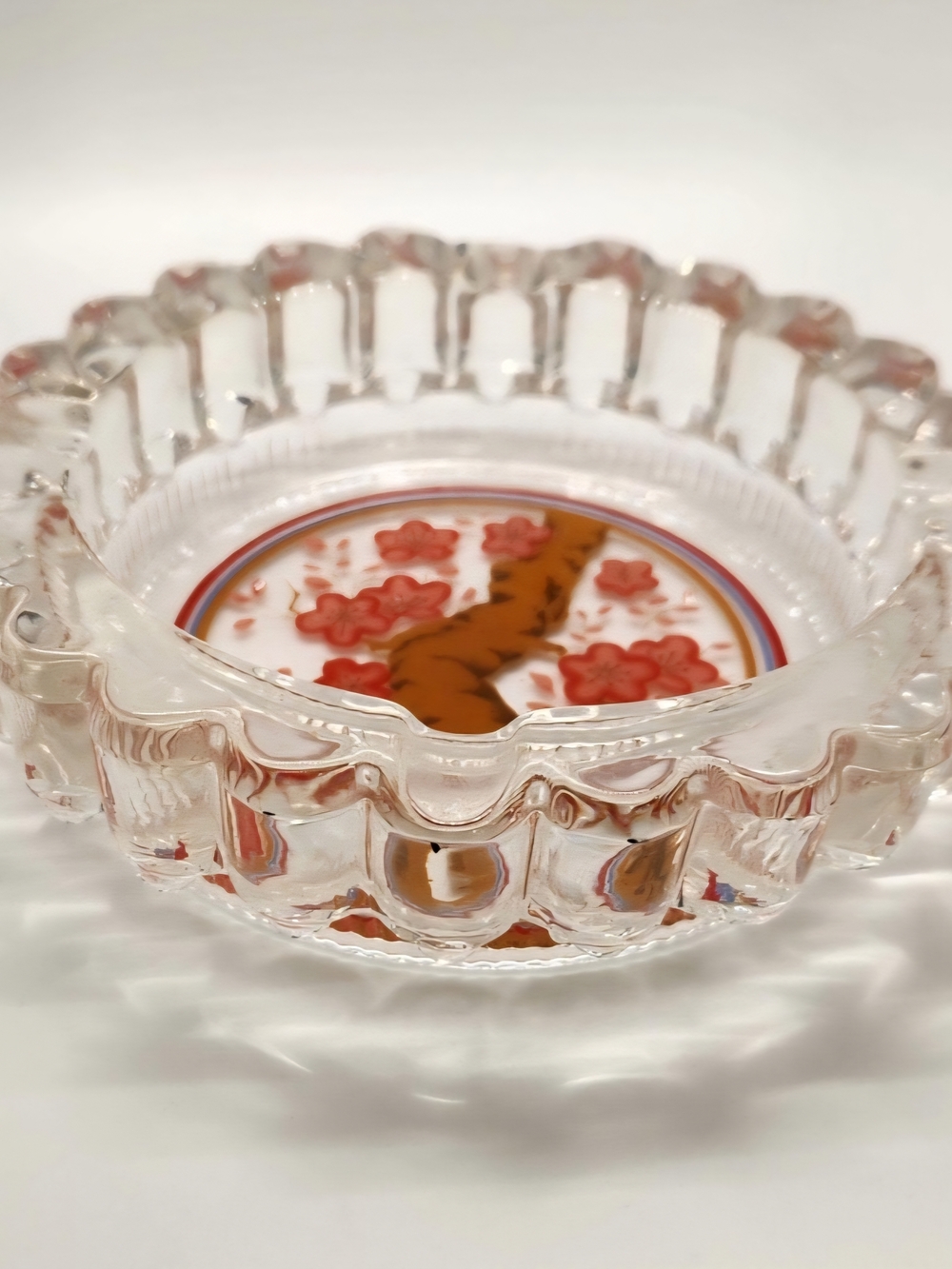 Vintage ashtray, heavy feel, cherry blossom design.